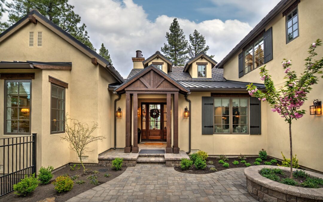 Landscaped front door entrance to a luxurious rustic home at the Parc Foret community in the Reno-Tahoe area